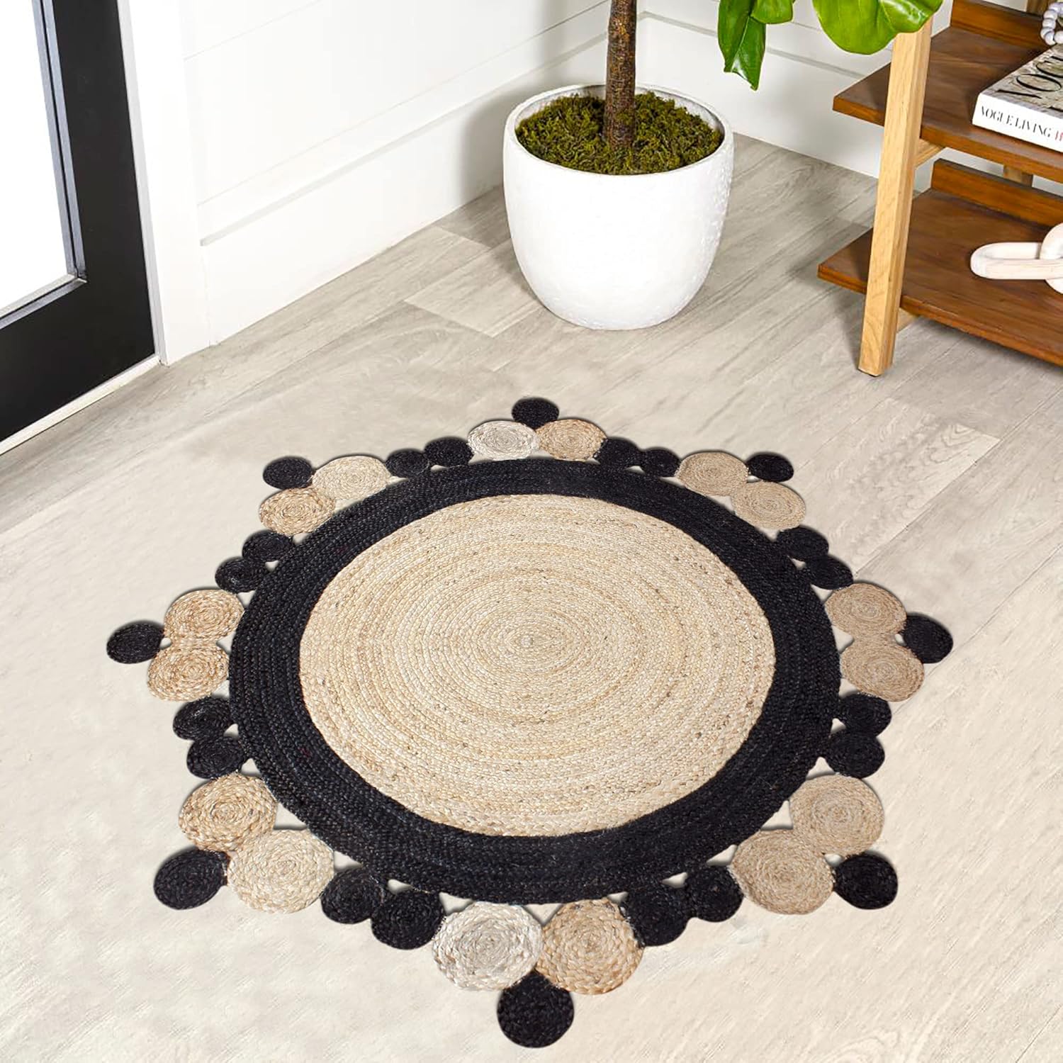 Natural Jute Area Rug with a round shape and scalloped edges, featuring a blend of beige and black tones.