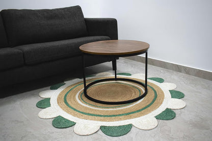Natural Jute Area Rug with a scalloped design in earthy tones, enhancing a cozy living room setting.