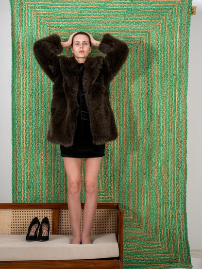 Cozy brown faux fur jacket, stylish and warm, perfect for winter fashion.