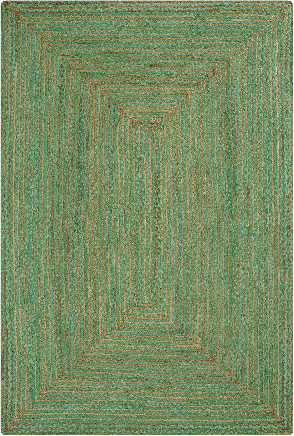Handwoven green area rug with geometric patterns and earthy tones, perfect for modern home decor.