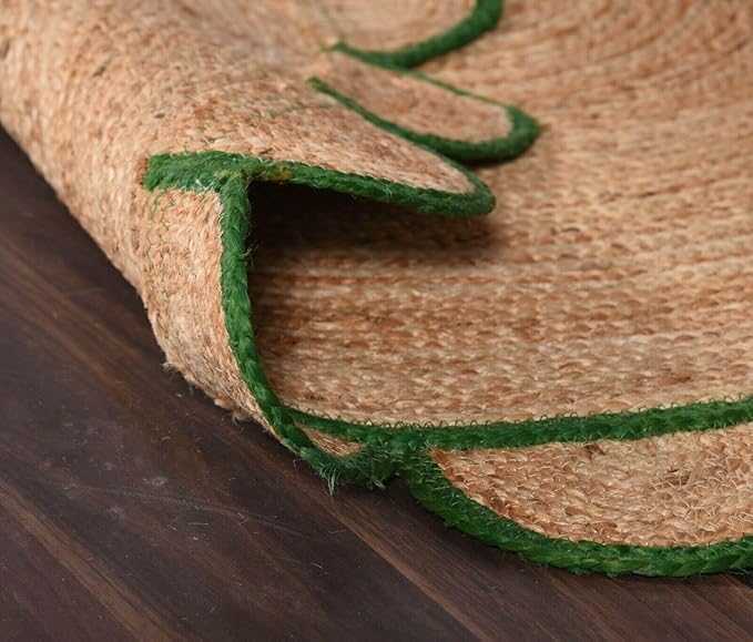 Coir mat with green edge on a wooden surface