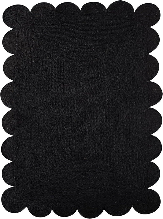 Black scalloped border on a black background