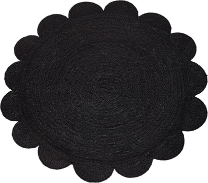 Black woven mat with scalloped edge on a white background