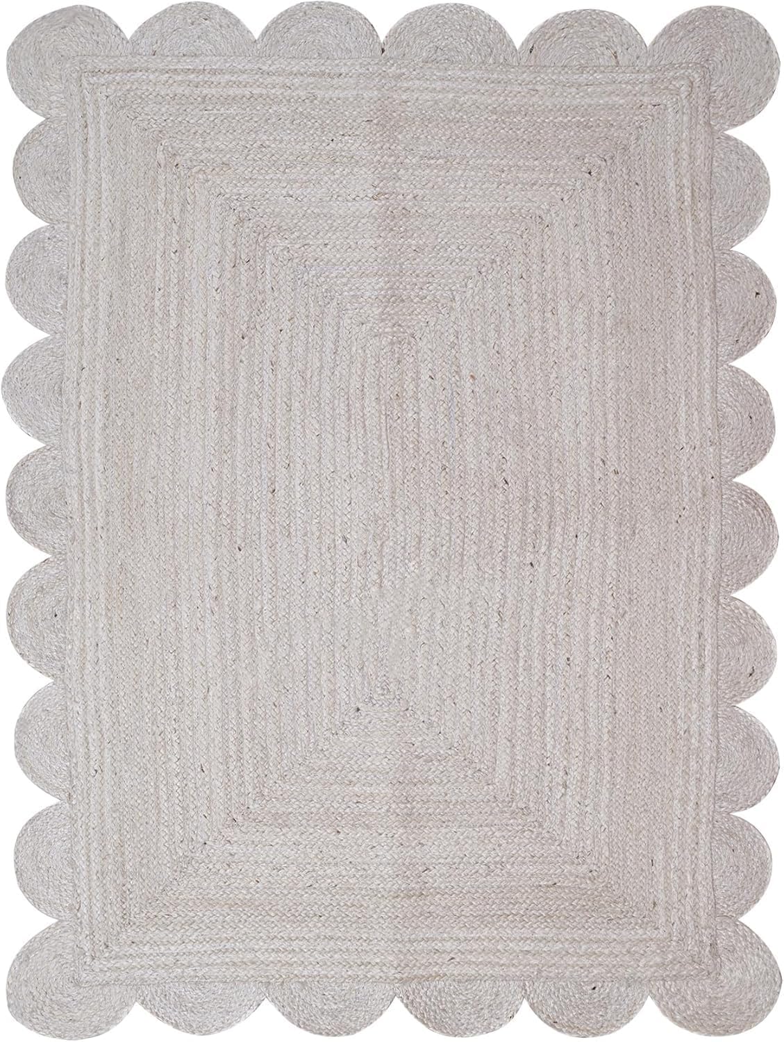 Gray braided rug with scalloped edge on a white background