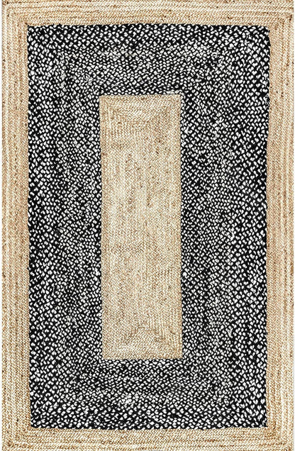 Rug with a black and white patterned border and beige center