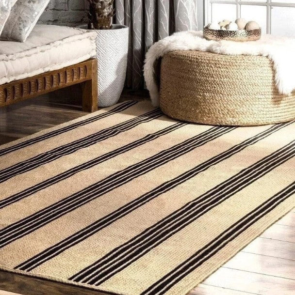 Beige rug with black stripes in a living room setting