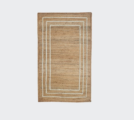 Rug with a natural border on a white background