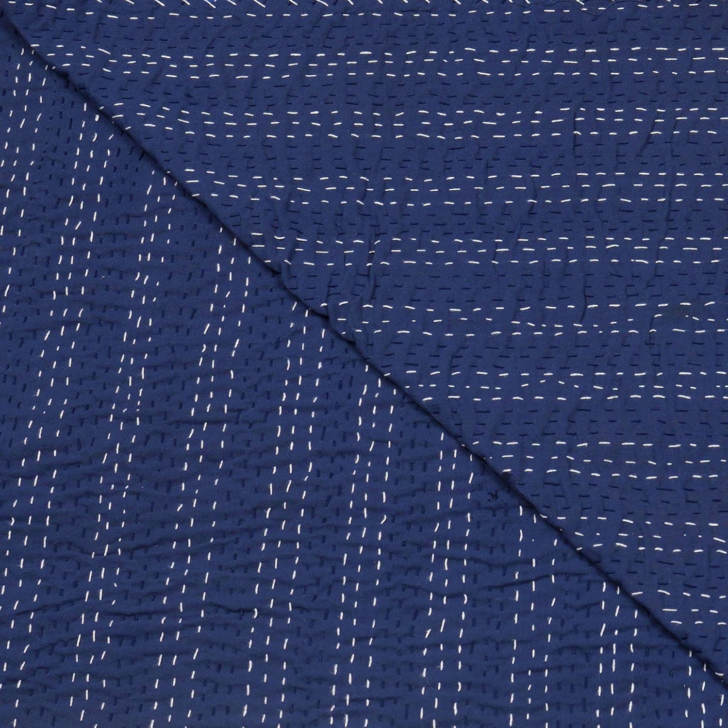 Navy blue fabric with white thread pattern