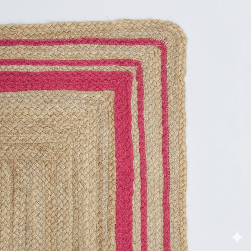 Woven rug with red border on a white background