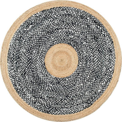 Round black and white patterned rug with a natural border on a white background