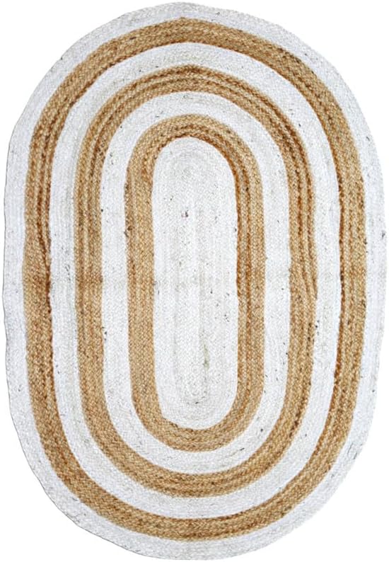 Handwoven oval area rug in white and tan, eco-friendly jute, perfect for rustic home decor.