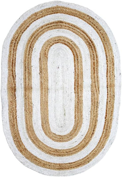 Handwoven oval area rug in white and tan, eco-friendly jute, perfect for rustic home decor.