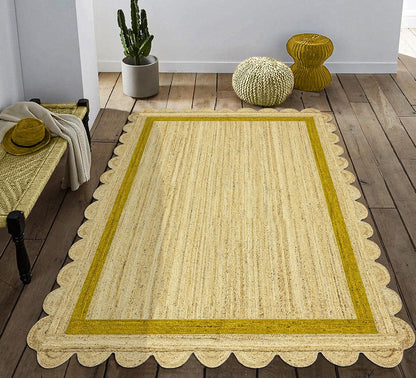 Natural Jute Area Rug with a scalloped edge in warm beige, perfect for enhancing any living space or entryway.
